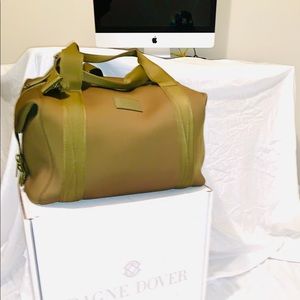 Dagne Dover, Landon Carryall designer bag.